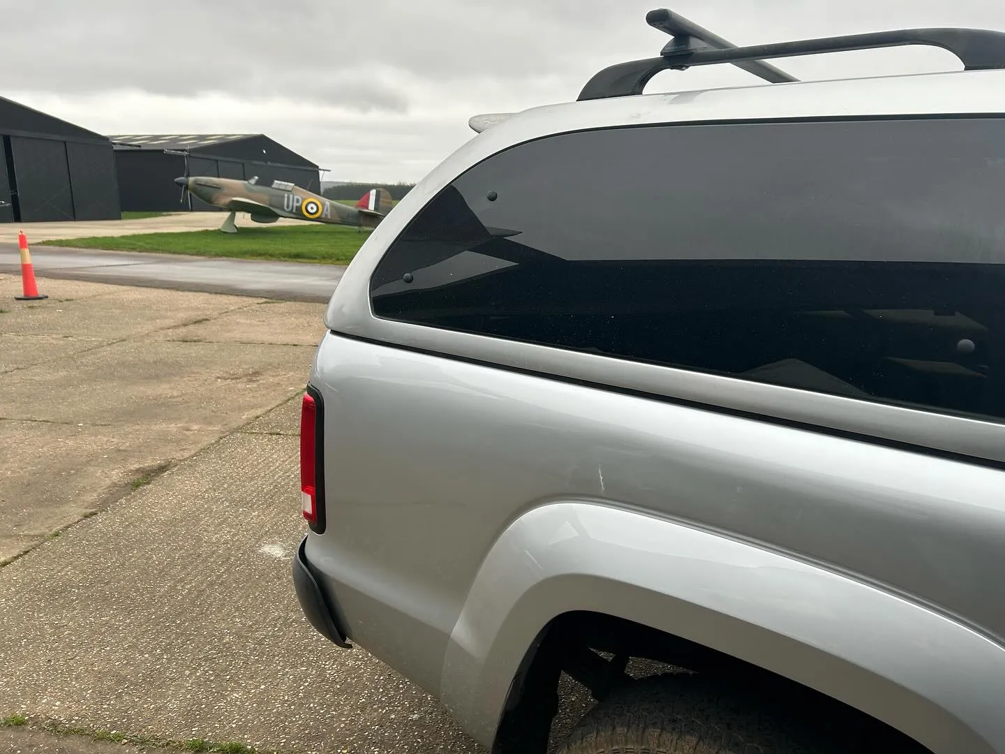 A truck parked on the side of a road.